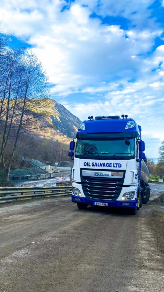 an osl truck in front of a blue sky